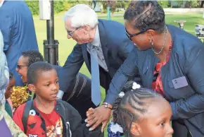  ?? ANNYSA JOHNSON / MILWAUKEE JOURNAL SENTINEL ?? Tony Evers, the state school superinten­dent and Democratic candidate for governor, greets students on the first day of school Tuesday at Maple Tree Elementary in Milwaukee.