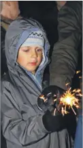  ?? FM4568204 ?? James Stirling, six, at the fireworks night at St Martin’s Church Hall