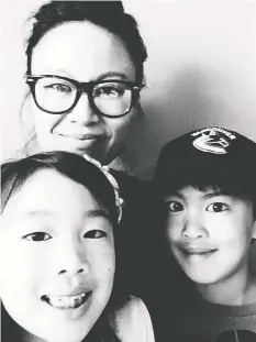  ?? — FANNY LAM ?? Vancouver baker, blogger and cookbook author Fanny Lam is pictured with her two children.