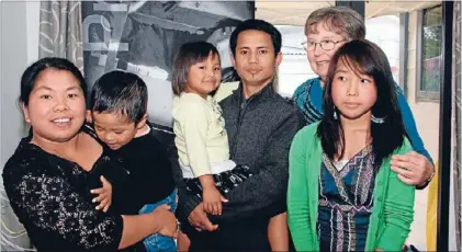  ?? Photo: SUPPLIED ?? Happy home: Bawi Tin Thang Sui Pum, wife Dawt Kyi Aye, their three children and family friend Mary Gemmill in their newly-built Habitat for Humanity home.