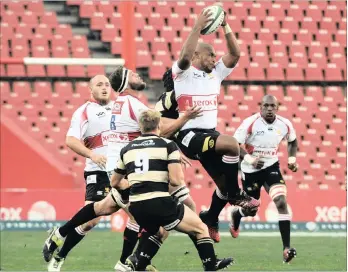  ??  ?? HIGH JUMPER: The Lions’ Ramone Samuels gathers the ball in a line-out against Boland at Ellis Park last night. Picture: BackpagePi­x