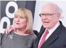  ?? — AFP ?? Susie Buffett and Warren Buffett arrive for the premiere of "The Post" Washington.