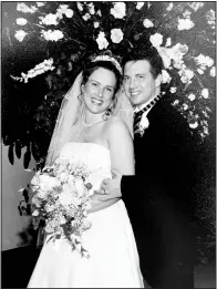  ?? (Special to the Democrat-Gazette/Amy Davenport) ?? Lari Daily and Michael Moix, married on May 11, 2002, met when he struck up a conversati­on on a plane. Lari says Michael’s family was shocked by this story. “They can’t believe this because he is an introvert,” she says. “But you would not have known it that day. He talked and talked, and I later described it to someone as it was like I met an old friend. We just connected on so many levels.”