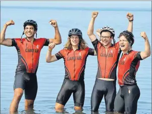  ?? DAVID JALA/CAPE BRETON POST ?? Four friends celebrated the end of their coast-to-coast ride with a dip in the Atlantic Ocean on Saturday in Glace Bay. From left, Yanir Levy, Tommy Spreit, Neil Schmitke and Chris Davidge completed the 6,700-km ride in 57 days to raise funds and...