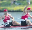  ?? THE CANADIAN PRESS ?? Canada’s Gabriel Beauchesne­Sevigny, left, and Benjamin Russell celebrate their gold medal victory in the C-2 1000m final canoe race at the Pan Am Games in Welland, Ont., Monday.
