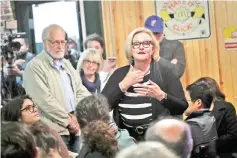  ??  ?? McCaskill encourages supporters to help get out the vote during a campaign stop at Shakespear­e’s Pizza in Columbia, Missouri. — AFP photo