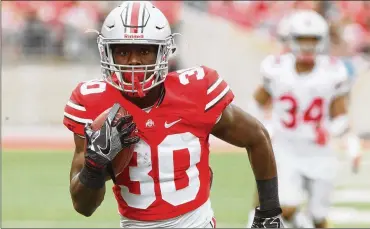  ?? DAVID JABLONSKI / STAFF 2017 ?? Ohio State’s Demario McCall was hampered by a groin injury last season, but in a year cut short by injury, he averaged 7.9 yards on 14 rushing attempts.