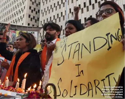  ??  ?? Crowds gathered in Karachi, Pakistan, on March 18 in support of the families of New Zealand’s victims.