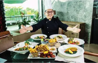  ?? ?? Chef Eric Lim presents The Raintree Restaurant’s new dishes.