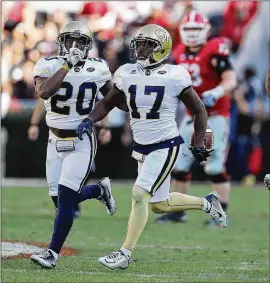  ?? CURTIS COMPTON / CCOMPTON@AJC.COM ?? Georgia Tech defensive back Lance Austin (17) celebrates after intercepti­ng UGA’s Jacob Eason in 2016. Tech won 28-27 at Sanford Stadium.