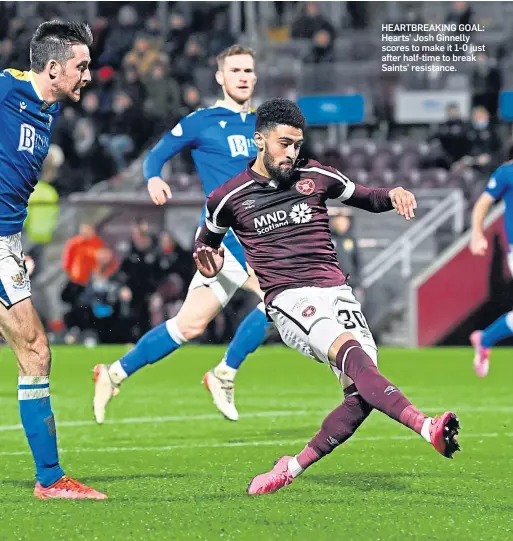  ?? ?? HEARTBREAK­ING GOAL: Hearts’ Josh Ginnelly scores to make it 1-0 just after half-time to break Saints’ resistance.