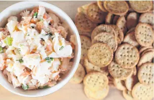  ?? CONTRIBUTE­D ?? This recipe for lobster roll dip, provided by Tracy Michael, will be a bite-sized favourite at a party.