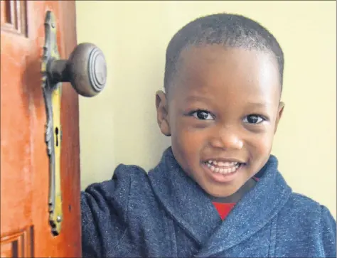  ?? LAWRENCE POWELL ?? Three-year-old Philemon is a bundle of energy and smiles since arriving at his new home in Annapolis Royal. Two weeks ago he was living in Ghana with his mother Anna Amegah and his three siblings.