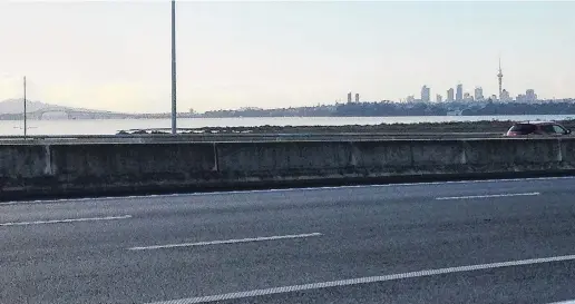  ?? PHOTOS: ELEANOR HUGHES ?? Rangitoto and the Auckland CBD from the NorthWeste­rn Motorway.