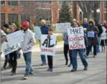  ?? KEITH REYNOLDS — THE MORNING JOURNAL ?? Hundreds of community members took to the streets on March 24 near Avon Lake High School, 175 Avon Belden Road, as part of the internatio­nal March for Our Lives.