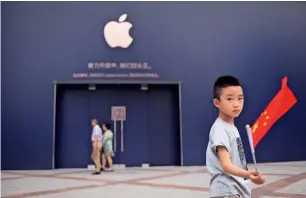  ?? AFP ?? Apple needs to ‘renovate’ its strategies in China to regain lost glory in a very key global market. —