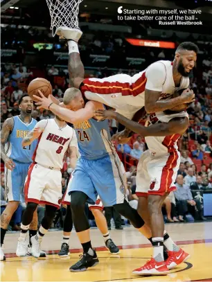  ?? AP ?? Starting with myself, we have to take better care of the ballRussel­l WestbrookM­iami Heat’s James Johnson (16) falls over Denver Nuggets’ Mason Plumlee (24) as he attempts to block a shot during the first half of an NBA basketball game, late on Sunday. —