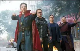  ?? MARVEL STUDIOS VIA AP ?? This image released by Marvel Studios shows, from left, Benedict Cumberbatc­h, Robert Downey Jr., Mark Ruffalo and Benedict Wong in a scene from “Avengers: Infinity War.”