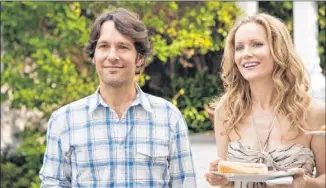  ??  ?? Paul Rudd and Leslie Mann star in “This Is 40,” which catches up with their background characters in the 2007 film “Knocked Up.”