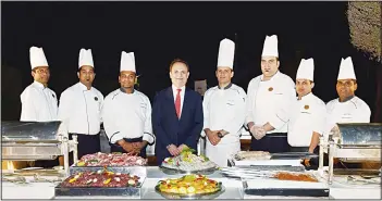  ??  ?? Nabil Hammoud with the chefs