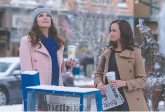  ?? NETFLIX ?? Lauren Graham, left, and Alexis Bledel star in Gilmore Girls, one of the many shows fans are rewatching during pandemic lockdowns.