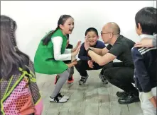  ??  ?? Top: William Yip, 43, a Beijing-based Hong Kong drama director and educator, takes part in an arts festival held in Hjorring, Denmark, in 2019, mixing with his students and internatio­nal friends. Above left and right: Yip teaches drama and plays with his students during classes held in Shanghai in 2019. PHOTOS PROVIDED TO CHINA DAILY