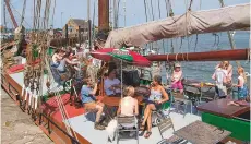  ??  ?? The North Sea Klipper Albatros is an ideal place to enjoy a drink or bite to eat while admiring the views across the harbour