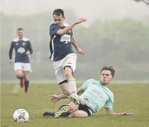  ?? ?? A Pompey Chimes player evades a Prince of Wales tackle during the fixture at Farlington