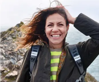  ??  ?? WINDSWEPT: Julia Bradbury on the tourist trail in Devon and Cornwall