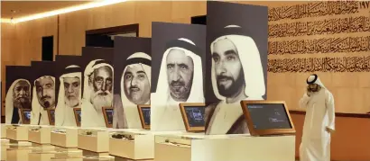 ?? Photo by Shihab ?? Portraits of the seven rulers of the seven emirates, and some of the items used by them on display at the museum. —