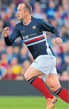  ?? Pictures: SNS/PA. ?? Charlie Adam, top, trains with his Dundee team-mates for the first time yesterday; Adam in action for his beloved Dee in Julian Speroni’s testimonia­l at Crystal Palace in May 2015, above.