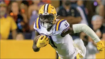  ?? MATTHEW HINTON — THE ASSOCIATED PRESS ?? LSU wide receiver Brian Thomas Jr. runs during an NCAA football game against Auburn on Saturday, Oct. 2, 2021 in Baton Rouge, La.