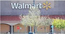  ?? RICARDO RAMIREZ BUXEDA/ORLANDO SENTINEL ?? Shoppers at Walmart in Azalea Park on April 8. The 32822 zip code is a hot spot with Orlando’s highest number of coronaviru­s cases.