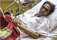  ?? AFP ?? Pakistani former field hockey goalkeeper Mansoor Ahmed is currently being treated at a hospital in Karachi. —