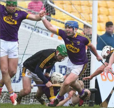  ??  ?? Kevin Foley reacts with delight after kicking in the vital Wexford goal during Saturday’s Walsh Cup decider