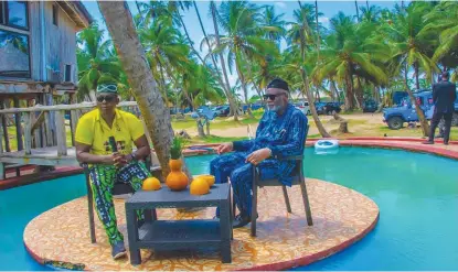  ??  ?? Akeredolu with Akinboboye on the swimming pool