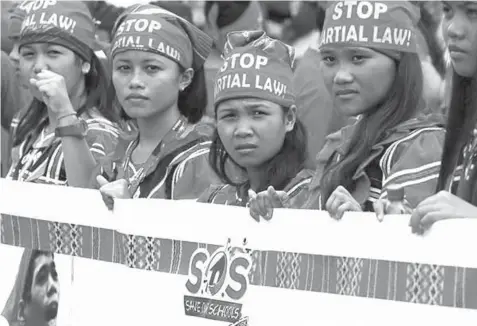  ?? ASSOCIATED PRESS ?? UN special rapporteur­s Victoria Tauli-Corpuz and Cecilia Jimenez-Damary said the ongoing militariza­tion in Mindanao has “massive and potentiall­y irreversib­le” impact on human rights of some lumads.