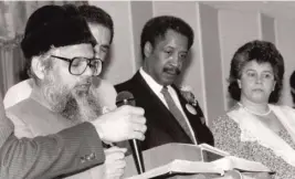  ?? SUPPLIED PHOTOS ?? LEFT: Irfan Ahmad Khan, with then- Mayor Eugene Sawyer in the background.