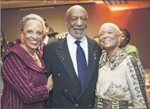  ?? Kevin Wolf AP Images for Smithsonia­n’s National Museum of African Art ?? JOHNNETTA B. COLE, left, National Museum of African Art director, with Bill and Camille Cosby at a 2014 museum gala.