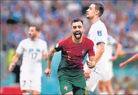  ?? AFP ?? Portugal midfielder Bruno Fernandes celebrates after scoring against Uruguay.