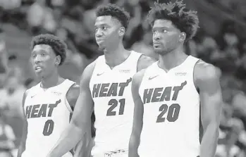  ?? BRYNN ANDERSON/AP ?? The Heat soon will be able to field a lineup with Josh Richardson, from left, Hassan Whiteside and Justise Winslow.