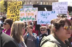  ??  ?? Thousands gathered and marched in a picket line outside the Oklahoma state Capitol building during the third day of a statewide education walkout in Oklahoma City, Oklahoma. — AFP photo