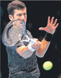  ?? Picture: PA. ?? Novak Djokovic: First man through to the semi-finals at the endof-season event.