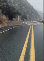  ?? CALTRANS DISTRICT 8 TWITTER ?? Highway 38 was closed Monday night due to storm damage in Valley of the Falls as sheets of slick mud and water were seen rushing across large sections of two-lane mountain roads.