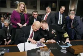  ?? EVAN VUCCI — THE ASSOCIATED PRESS ?? Director of National Intelligen­ce James Clapper, left, talks with National Security Agency and Cyber Command chief Adm. Michael Rogers on Capitol Hill in Washington on Thursday at the conclusion of a Senate Armed Services Committee hearing: “Foreign...