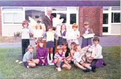  ??  ?? Mr Bohringer with pupils at Briary Primary School in the 1970s