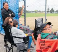  ?? ?? Lisa Roiri was one of many to enjoy the afternoon’s softball action up close from the comfort of a chair.