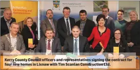  ??  ?? Kerry County Council officers and representa­tives signing the contract for four new homes in Lixnaw with Tim Scanlan Constructi­on Ltd.