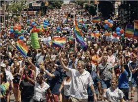  ?? ANDRES KUDACKI — ASSOCIATED PRESS ?? New York City Mayor Bill de Blasio, bottom center, marches during the New York City Pride Parade on Sunday, June 25, 2017, in New York.