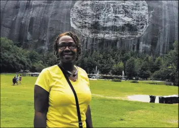  ?? Steve Hendrix The Washington Post ?? Naomi Jones, a frequent picnicker at Stone Mountain, said she has mostly ignored the park’s massive monument to Confederat­e leaders Robert E. Lee, Thomas “Stonewall” Jackson and Jefferson Davis. Now she wants it removed.